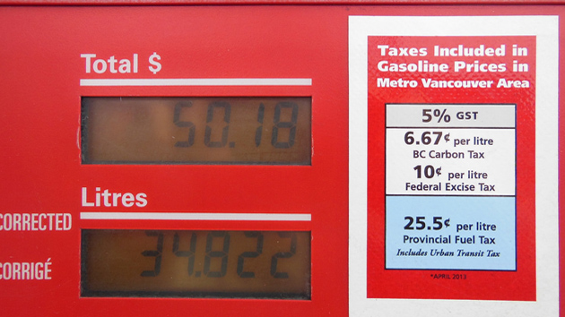 A gas pump in Vancouver, British Columbia displays the carbon tax. (Steven Godfrey/Flickr) carbon_tax630x354